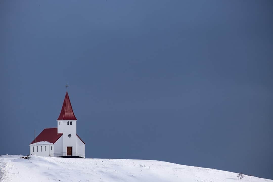Fujifilm UKさんのインスタグラム写真 - (Fujifilm UKInstagram)「"The beautiful Myrdal Church stands on a hilltop overlooking the town of Reynisfjara, it really stands out with its striking red roof. I wanted to isolate the church to avoid any distractions." Has anyone else been lucky enough to visit this beautiful location?  Image credit: @lever.gary  X-T3 XF55-200mmF3.5-4.8 R LM OIS F6.4, ISO 400, 1/1600 sec  #FujifilmXT3 #XT3 #XSeries #Fujifilm」1月6日 19時00分 - fujifilmuk