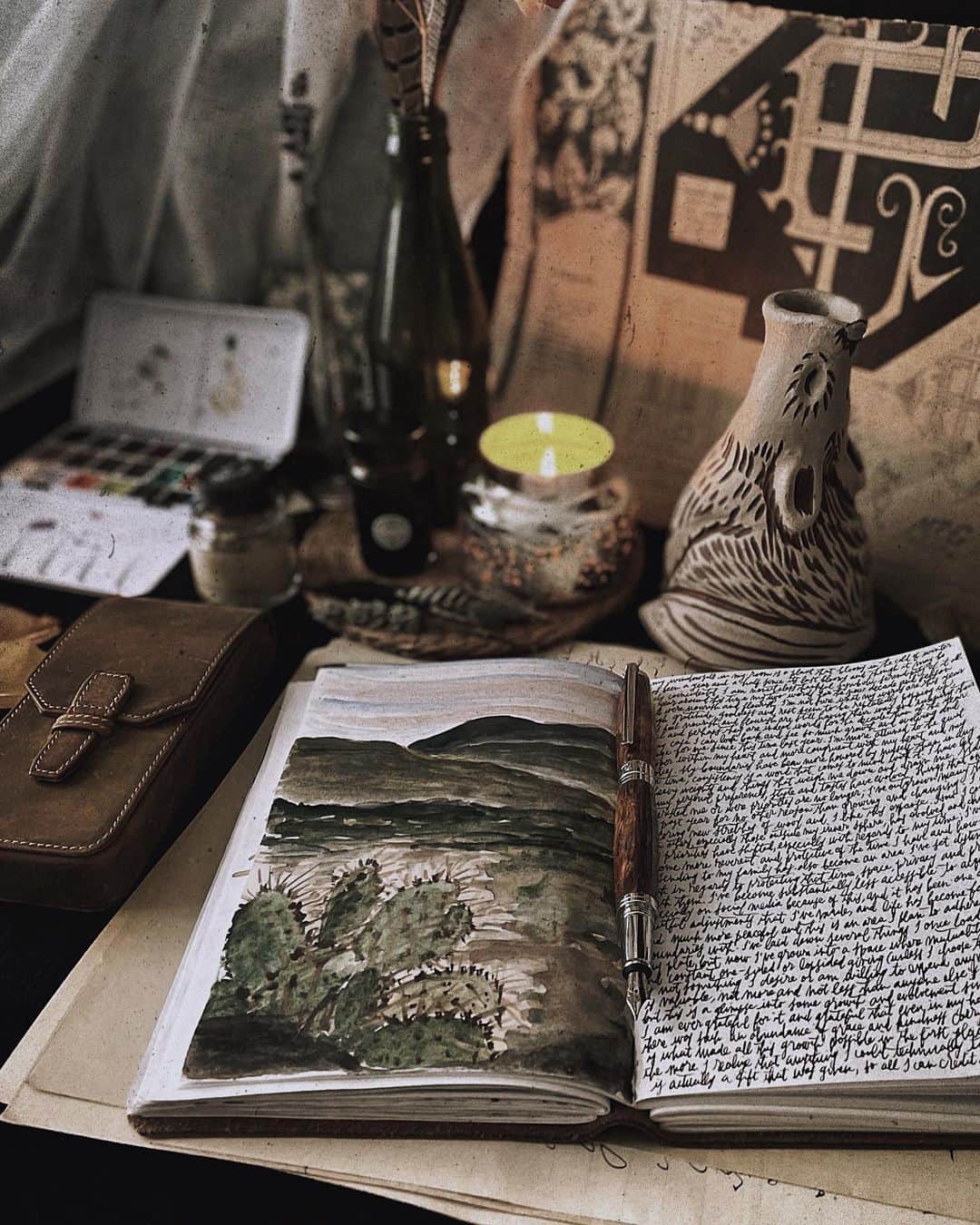 Catharine Mi-Sookさんのインスタグラム写真 - (Catharine Mi-SookInstagram)「A peaceful pause, inner sustenance and nourishment. With incense curls that harken me back to memories of fragrant wild spices lingering in the desert breeze. All my words pour in pages and brush strokes. My heart is in a quiet space this week. I like it here. 🌾 . . . . . Baoshi Soyouz Fountain Pen in Amber @recifeparis. Leather Journal @loombound. Boot Leather Penvelope Case & Brown 732 (my favorite of all brown inks) @franklinchristoph. Ceramic #mypitchpine Wolf Incense Burner @pitchpinepottery. Watercolors @caseformaking. . . . . . #journal #memoirs #watercolorsketch #recifeparis #fountainpen #recife #writinginstruments #franklinchristoph #fountainpenink #pencase #loombound #handmadejournal #myquietbeauty #watercolorlandscape #artjournalpages #darkacademiaaesthetic #candlemagic #pitchpinepottery #loveforanalogue #poetryofsimplethings #caseformaking #watercolorcactus #myeverydaymagic #beautyofstillmoments #stillswithstories #lifeunscripted #alittlebeautyeveryday」1月7日 3時51分 - catharinemisook