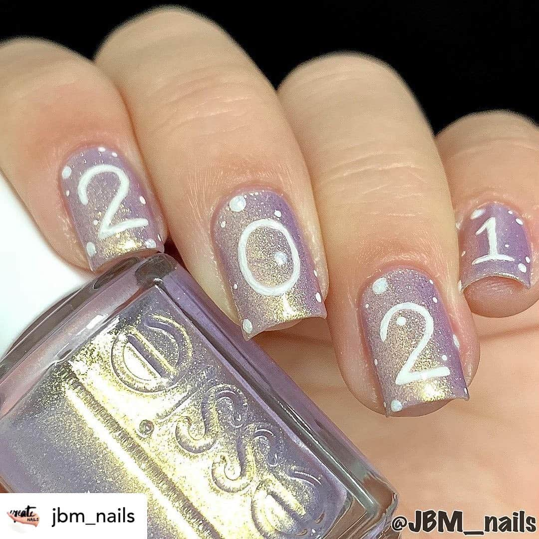 Nail Designsさんのインスタグラム写真 - (Nail DesignsInstagram)「Credit • @jbm_nails ••ℂ𝕠𝕞𝕚𝕟𝕘 𝕊𝕠𝕠𝕟•• • ✔️ʙᴀsᴇᴄᴏᴀᴛ: TLC 08 Laven-dearly ✔️ᴍᴀɪɴ ᴄᴏʟᴏʀ: #SugarplumFairytale ✔️ᴅᴇsɪɢɴ: White Acrylic Paint by @applebarrelcrafts  ✔️ᴛᴏᴘᴄᴏᴀᴛ: Gel Couture • **all @essie polishes** ——————————————— #essie #essielovesSPARKLE #nails #nailsnailsnails #nailaddict #nailart #nailartdesign #naildesign #nailblogger #nailsdid #nailfie #nailinspo #nails2inspire #nailswag #nailsoftheday #nailsofinstagram #instanails #freehandnailart #handpaintednailart #welcome2021 #2021 #comingsoon #holidaynails #nailitdaily #nailspafeature #ECCfeature #gobeyondthebottle #gobeyondthebottleCAN #JBM_nails」1月7日 9時12分 - nailartfeature