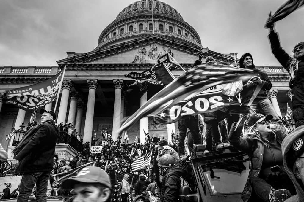 National Geographic Creativeのインスタグラム：「Photo by @nina_berman / A pro-Trump mob broke through security barriers and geared up to storm the U.S. Capitol following a rally yesterday, the day set for ratifying President-elect Joe Biden’s electoral college victory over President Trump in the 2020 election. The rioters prompted a lockdown of the Capitol and an evacuation of lawmakers. After the building was cleared, Congress resumed the electoral count, with results certified at 3:45 a.m.」