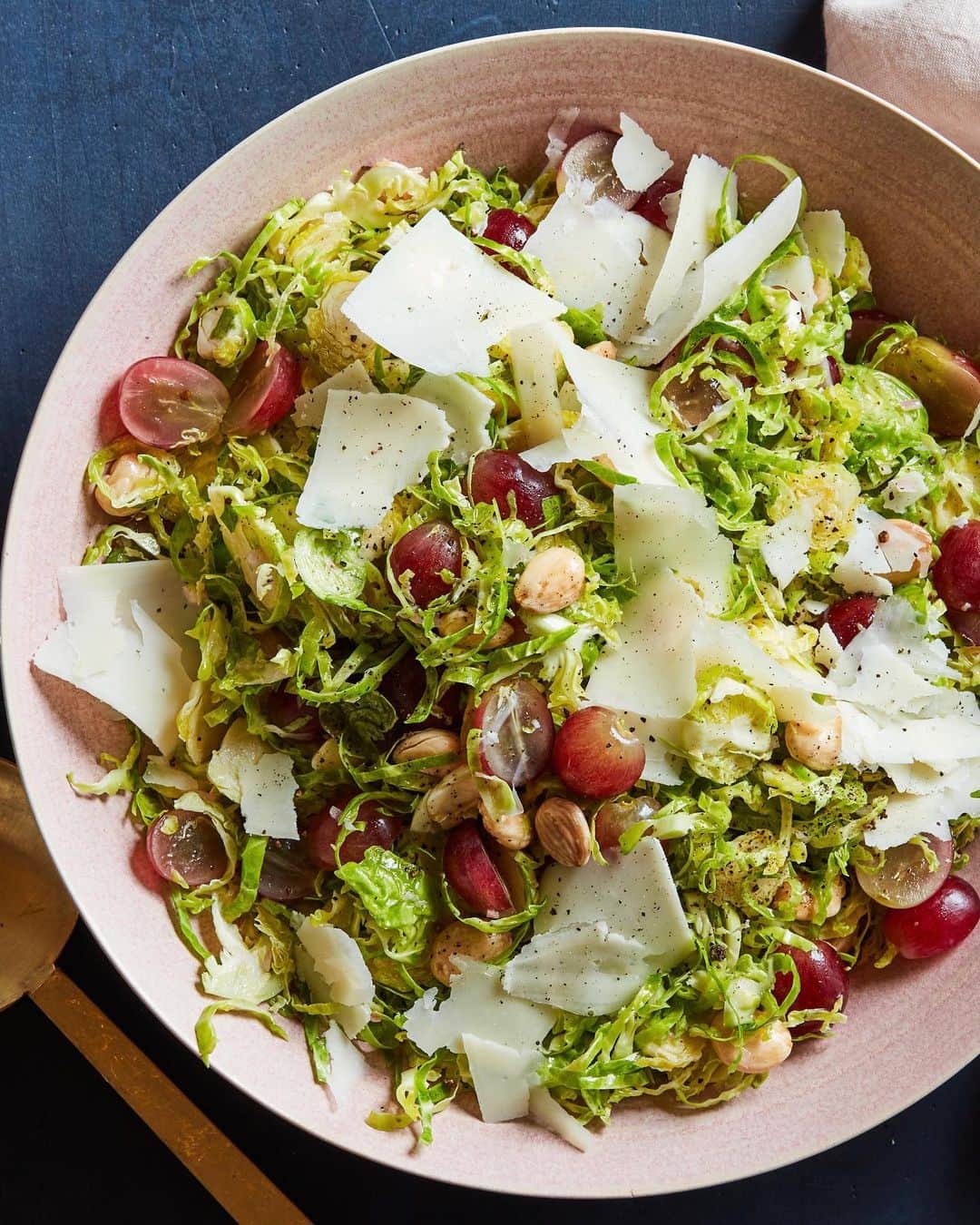 Gaby Dalkinのインスタグラム：「Shoving as many veggies in this body as possible before bebe! This Shaved Brussels situation with grapes and marcona almonds is the current obsession! Chicken or salmon on top optional! Recipe linked in my profile https://whatsgabycooking.com/shaved-brussels-sprouts-salad/」