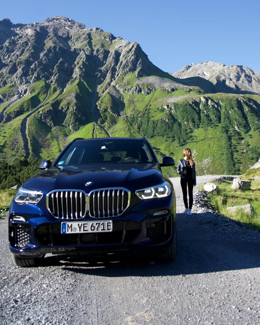 BMWのインスタグラム：「Climb every mountain, 'til you find your dream. The BMW X5. #TheX5 #BMW #X5 @alice.linari @loalesi  __ BMW X5 xDrive45e: Fuel consumption weighted combined in l/100km: 2.1–1.6 (NEDC); 1.7–1.2 (WLTP), CO2 emissions weighted combined in g/km: 47–37 (NEDC); 29–27 (WLTP), Power consumption weighted combined in kWh/100km: 25.2–23.5 (NEDC); 27.7–24.3 (WLTP). Further information: www.bmw.com/disclaimer   286 hp, 210 kW, 450 Nm, Acceleration (0-100 km/h): 5.6 s, Top speed (limited): 235 km/h.」