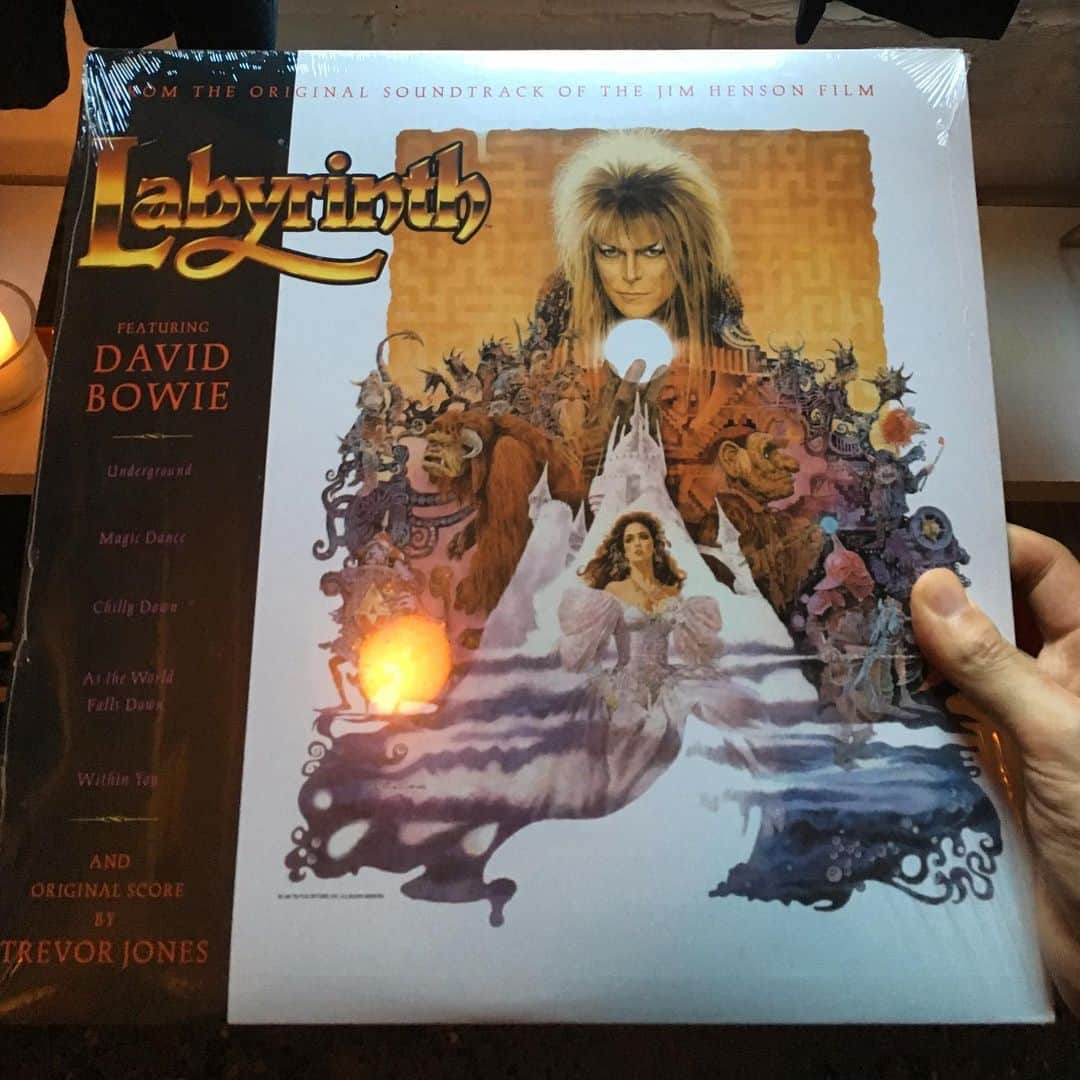 ケンゾーミナミのインスタグラム：「Speaking of the world falling down, the last winter when I was at my parents’ in Japan, I was looking for my copy of this album because this was the first vinyl album I bought at the movie theater when I went to see the film with my family when I was little. (Jim Henson, Frank Oz & David Bowie for sure but also since we had an Old English Sheep Dog, our family had a ritual of watching anything with Old English Sheepdog in it.) And I couldn’t find it since it turned out that my brother took it with him to his place in Tokyo. (Though it’s totally okay! I rather you have it with you and someone actually taking care of it than it sitting in garage.)  “As The World Falls Down” was the favorite song of mine on this and still is. Not sure if you have seen the music video of it but it’s sort of like epilogue of the film.  Also, it’s magical to look back on living in Nolita 5 blocks away from his apartment when he was still alive and seeing him with Mrs. Iman sometimes in the neighborhood.  Happy Birthday Mr. David Bowie.  #davidbowie #labyrinth」