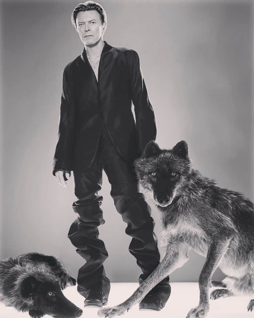 スリーアズフォーのインスタグラム：「Happy Birthday to the one & only @davidbowie ! We were so honored to have you ROCK our garments back in 2002 for @gq photographed by @klinkoandlee @indranipc styled by @gk.reid #davidbowie #gq #davidbowieforever @the_real_iman」