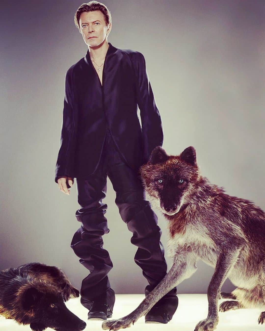 スリーアズフォーのインスタグラム：「Happy Birthday to the one & only @davidbowie ! We were so honored to have you ROCK our garments back in 2002 for @gq photographed by @klinkoandlee @indranipc styled by @gk.reid #davidbowie #gq #davidbowieforever @the_real_iman」