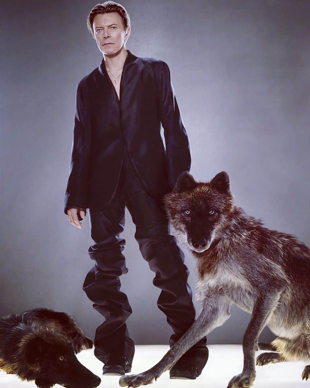 スリーアズフォーのインスタグラム：「Happy Birthday to the one & only @davidbowie ! We were so honored to have you ROCK our garments back in 2002 for @gq photographed by @klinkoandlee @indranipc styled by @gk.reid #davidbowie #gq #davidbowieforever @the_real_iman」