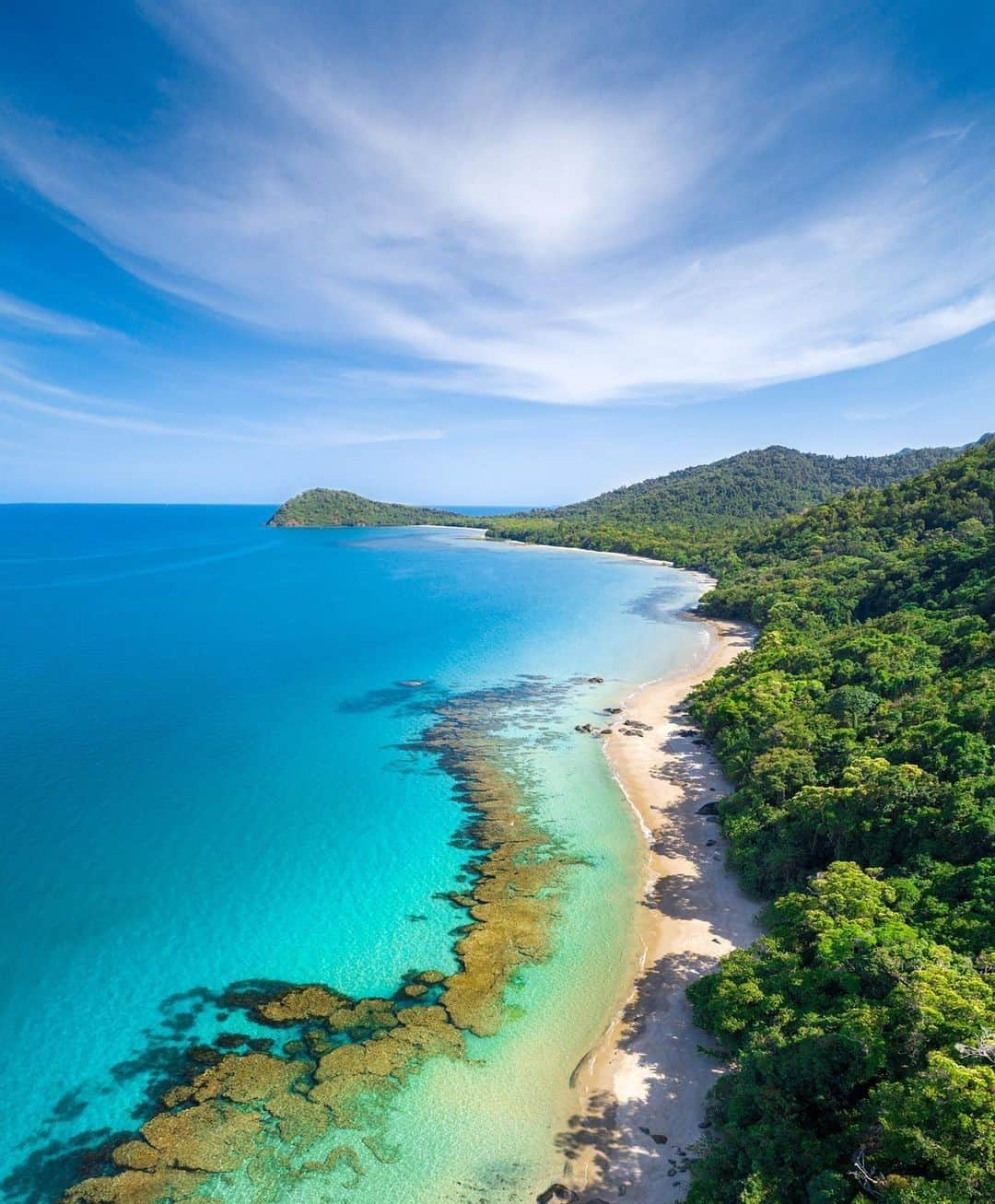 Australiaさんのインスタグラム写真 - (AustraliaInstagram)「“There’s nothing quite like @tropicalnorthqueensland ❤️” We tend to agree with you on that one @davewilcockphotography! This idyllic scene was captured on the remote headland of #CapeTribulation where two UNESCO World Heritage Sites meet – the Wet Tropics Rainforest and the #GreatBarrierReef. You could spend a lifetime here adventuring into the #DaintreeRainforest, exploring the magnificent #MossmanGorge, and recharging on the beautiful beaches. This incredible part of @queensland was named “the most extraordinary place on Earth” by Sir David Attenborough, so you know it’s going be pretty special ✨ #seeaustralia #thisisqueensland #exploreTNQ #holidayherethisyear」2月3日 19時00分 - australia