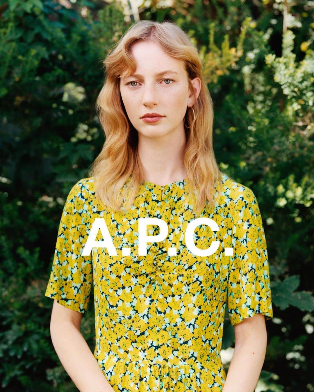 アーペーセーのインスタグラム：「A.P.C. Spring/Summer 2021 collection.⠀ ⠀ @linasuenaert is wearing the Jayla dress in yellow and the Marilou earrings in gold.⠀ ⠀ Photography : @julie_greve ⠀ Creative direction: @suzannekoller ⠀ ⠀ Available in stores and at apc.fr⠀ ⠀ #APC #APCcollection #APCSS21」