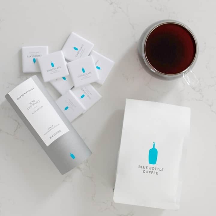 Blue Bottle Coffeeのインスタグラム：「Is coffee your love language? ⁠ ⁠ This week, we’re offering a limited-edition set featuring our Bella Donovan blend with a slender canister of 15 bite-sized @tchochocolate. The dark chocolates (70% cacao) are designed exclusively to pair with our coffees, sweetened just enough to stand up to the rich cocoa flavors in Bella yet never obscure its subtler raspberry notes. ⁠ ⁠  Use our link in bio to send this gift to someone you love—even yourself. Because coffee + chocolate = 💙」