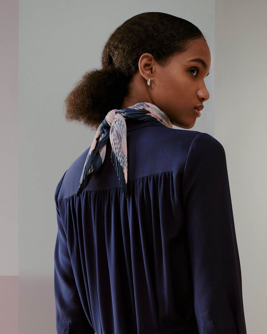 Club Monacoのインスタグラム：「A hint of pattern applied to a classic pleated scarf provides the perfect seasonal update.」