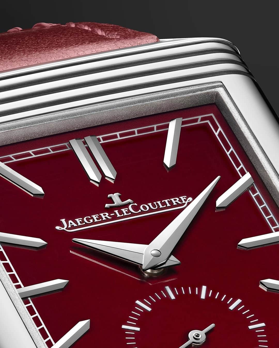 ジャガールクルトのインスタグラム：「Reverso, contrasting shade, captivating details.  #Reverso _ Reverso Tribute Small Seconds _ Art Deco lines featuring iconic gadroons, surrounded by a sunray-brushed burgundy-red dial, applied hour-makers and dauphine hands. A timepiece imbued with savoir-faire and refinement. Could it be the gift of a lifetime?  _ #JaegerLeCoultre #Reverso #JLCGift #ValentinesDay #Style #ArtDeco #Icon #HomeofFineWatchmaking #SwissWatch #ValleeDeJoux #Watchmaking #Craftsmanship #SavoirFaire」