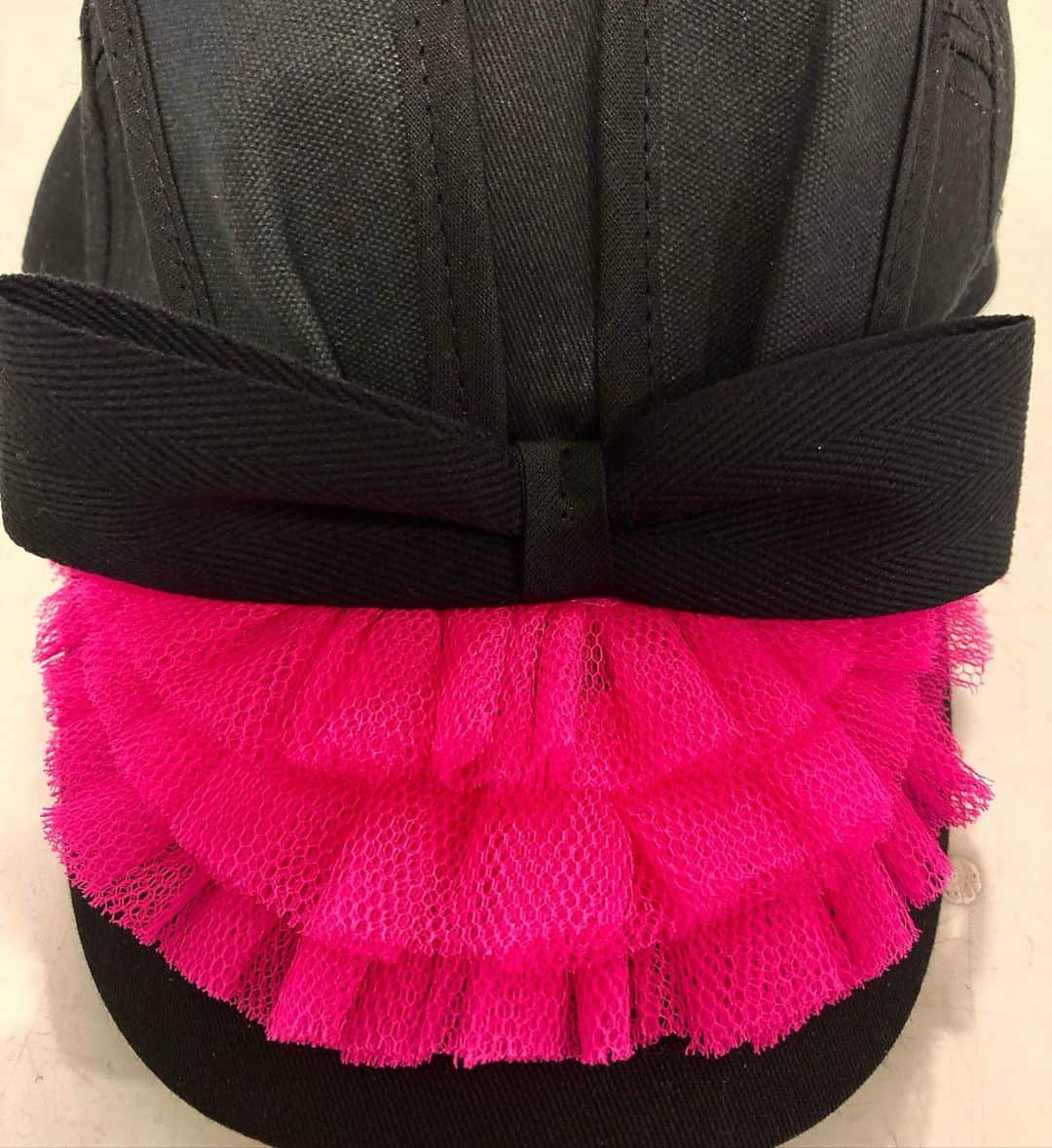 バーンストックスピアーズのインスタグラム：「Working on our collection for AUTUMN WINTER 21. We are playing with texture using predominantly black utility fabric with added pops of shocking pink frivolity. These frill caps are made from cotton mixed with tu-tu netting.  All our hats are created and crafted in our East London Studio.  To request a look-book please contact showroom@the-alphabet.co.uk  @the_alphabet_london」