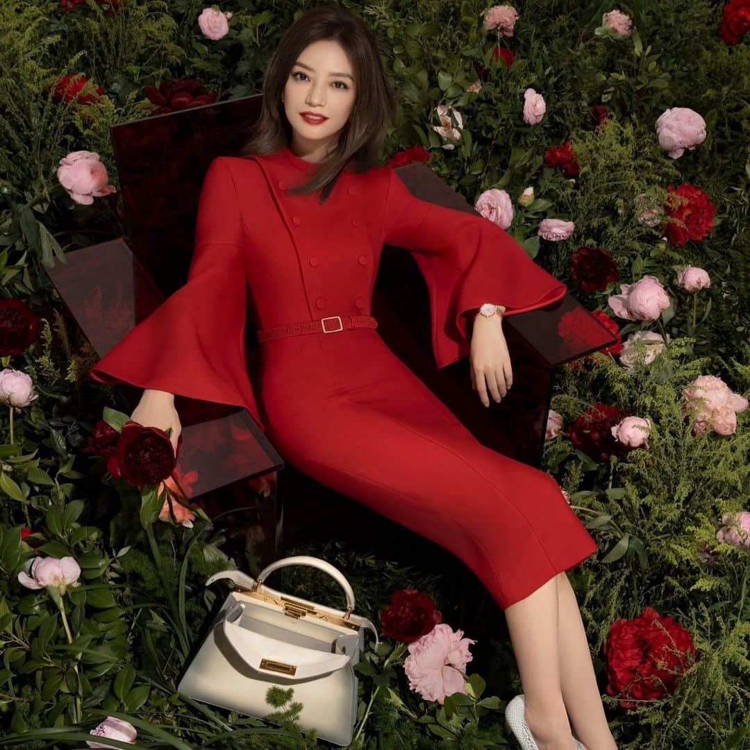 Fendiのインスタグラム：「Refined in red. @vicki_zhaowei looks fierce and ultra-feminine wearing the #FendiSS21 dress with tulip sleeves in the latest #FendiPeekaboo campaign.」
