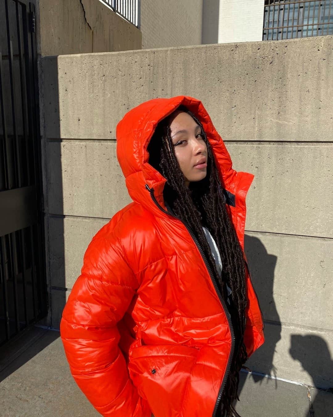 DKNYのインスタグラム：「@NajalJudd wears the #DKNY Long Puffer on the streets of New York.」