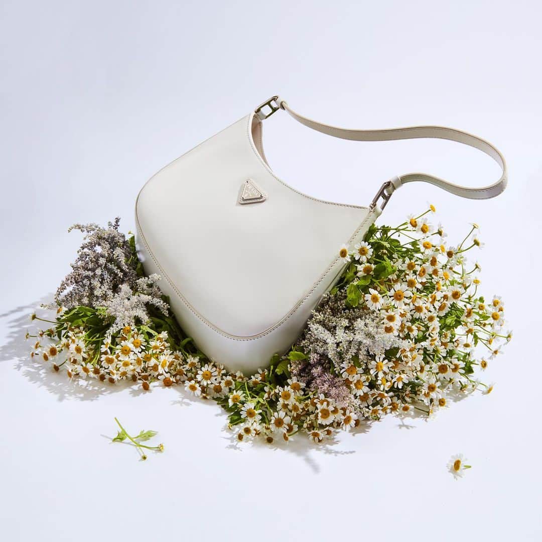 Saks Fifth Avenueのインスタグラム：「HANDBAG HEROES: The bags are in bloom. Get ready for spring with @prada's Cleo bag—a sleek revival of an iconic '90s shoulder bag silhouette. #SaksStyle」
