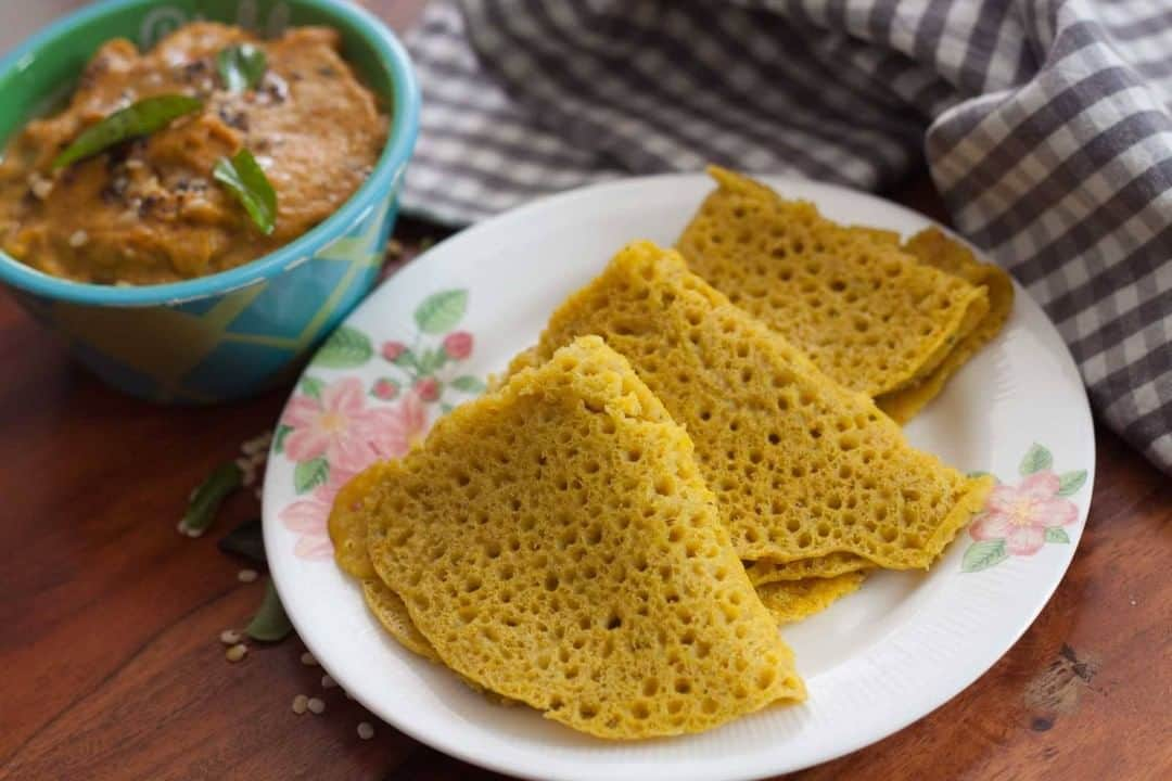 Archana's Kitchenさんのインスタグラム写真 - (Archana's KitchenInstagram)「Spicy Neer Dosa Recipe is a slight variation to the usual neer dosa that is white in color. We have added whole spices like coriander seeds, dry red chillies, fenugreek seeds, cumin seeds and curry leaves that are ground and put into the batter. The rest of the method remains the same. You can even make this neer dosa with rice flour and just mix water to it so that you can make something instant for breakfast.   Get the recipe from the smart.bio link in my profile @archanaskitchen . . . . . #recipes #easyrecipes #breakfast #Indianbreakfast #archanaskitchen #healthyeating #highprotein #breakfastclub #dosa #dosarecipes #dosabatter #ragi #ragidosa #mysoremasaladosa #homemadefood #eatfit #cooking #food #healthyrecipes #foodphotography #recipeoftheday #comfortfood #deliciousfood #delicious #instayum」2月5日 11時30分 - archanaskitchen