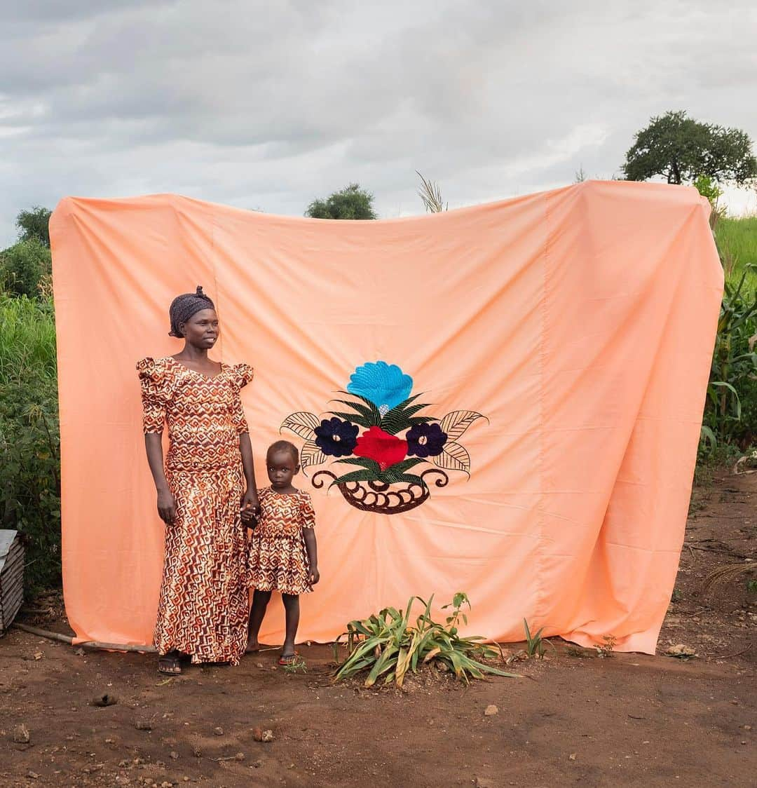 thephotosocietyさんのインスタグラム写真 - (thephotosocietyInstagram)「Photo by @noralorek // When Rose Asha Sillah fled the civil war in South Sudan she brought her milaya, a traditional embroidered bedsheet. Now she runs a women’s center in the Bidibidi refugee settlement that teaches milaya-making skills, and the milayas are sold through @milayaproject. “We need to be self-reliant," Sillah says. “We need to look forward.”   The civil war in South Sudan has displaced two million people. When refugees arrived in Uganda, they carried their only possessions wrapped in milaya. Today in Bidibidi, milayas are being sewn but there are few customers. The Milaya Project helps turn artist collectives into self-sufficient businesses. Follow @milayaproject for more information on how to support these women.」2月6日 3時07分 - thephotosociety