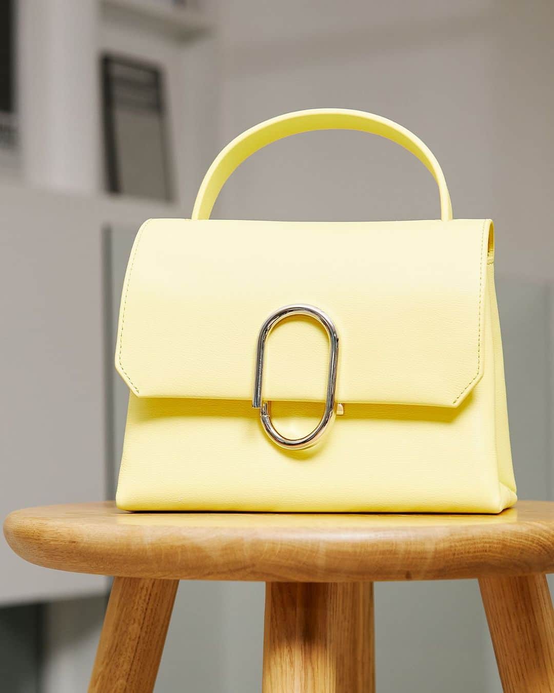 The Outnetのインスタグラム：「When life gives you a lemon-hued @31philliplim bag, you wear it with everything, obviously.   Shop all your favorite Instagram looks, just visit the link in bio」