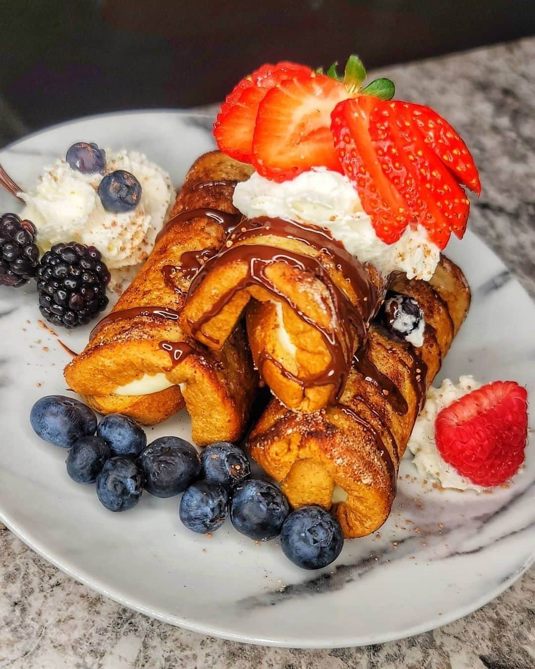 Flavorgod Seasoningsさんのインスタグラム写真 - (Flavorgod SeasoningsInstagram)「Cream cheese French toast roll ups 😋 by @cynfully_lowcarb topped with @flavorgod buttery cinnamon topping⁠ -⁠ Add delicious flavors to your meals!⬇️⁠ Click link in the bio -> @flavorgod  www.flavorgod.com⁠ -⁠ @aldiusa keto bread, egg, cinnamon⁠ @flavorgod buttery cinnamon topping⁠ @meltorganic butter⁠ @lakanto powdered sweetener⁠ @choczero keto hazelnut spread⁠ •Sugar free whipped cream and berries⁠ •Cream cheese frosting⁠ 1 block cream cheese⁠ 1/4 C @meltorganic butter⁠ 1 C @lakanto powdered sugar⁠ 1/2 t vanilla extract⁠ -mix until smooth. Add to piping bag.⁠ ⁠ -Flattened bread with a rolling pin. Added cream cheese frosting on short edge and rolled. Closed with toothpick. Dipped in a whipped egg with @flavorgod buttery cinnamon topping, fried with @meltorganic butter on all sides in a pan. Rolled in cinnamon and powdered @lakanto. Topped with @choczero keto hazelnut spread, sugar free whipped cream and berries 👌⁠ -⁠ Flavor God Seasonings are:⁠ 💥 Zero Calories per Serving ⁠ 💥 KETO & PALEO⁠ 💥 VEGAN Options ⁠ 💥 Low Salt⁠ 💥 GLUTEN FREE & KOSHER⁠ 💥 NO MSG⁠ 💥 DAIRY FREE Options⁠ 💥 All Natural & Made Fresh⁠ 💥 Shelf life is 24 Months⁠ -⁠ #food #foodie #flavorgod #seasonings #glutenfree #mealprep #seasonings #breakfast #lunch #dinner #yummy #delicious #foodporn」2月6日 22時01分 - flavorgod