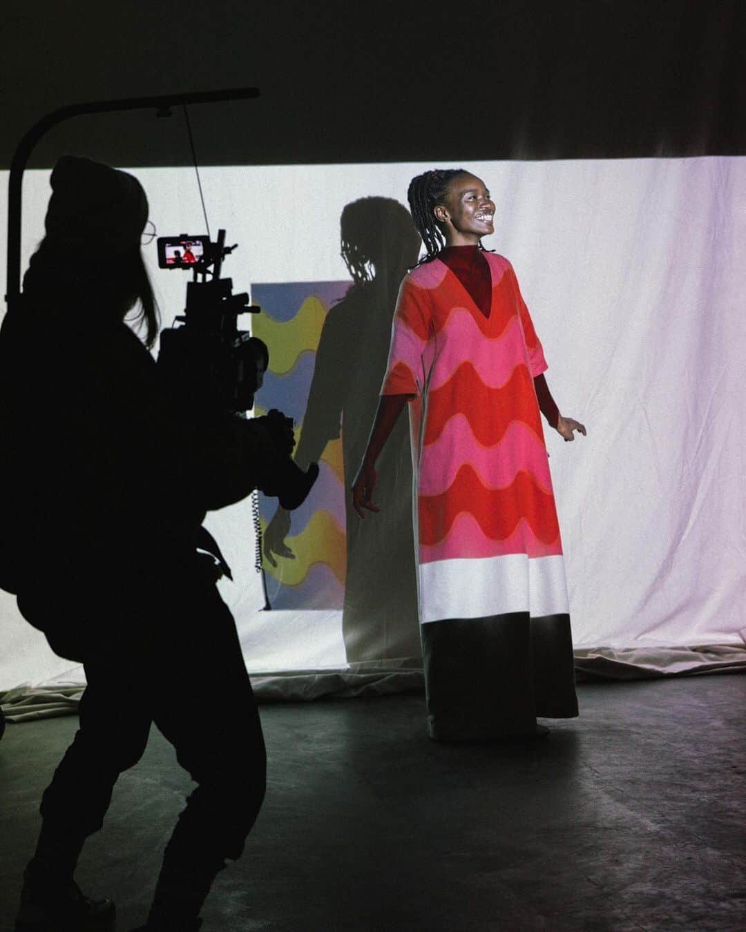 マリメッコのインスタグラム：「A sneak peek to behind the scenes of The Art of Print and Shape short film shoot! The film was done in collaboration with creative agency MOON, @moon_intl , and directed by Åsa Riton. ⠀⠀⠀⠀⠀⠀⠀⠀⠀ Instead of a seasonal collection, we wanted to present a conceptual film that highlights the core of Marimekko: timeless design, the art of printmaking, and our commitment to sustainability. As a part of our newly released sustainability targets, we have committed to drastically reduce its environmental impact. For us, it was important, that also the carbon footprint from the film's production will be offset.  ⠀⠀⠀⠀⠀⠀⠀⠀⠀ Watch the full film via IGTV! #marimekko #cphfw」
