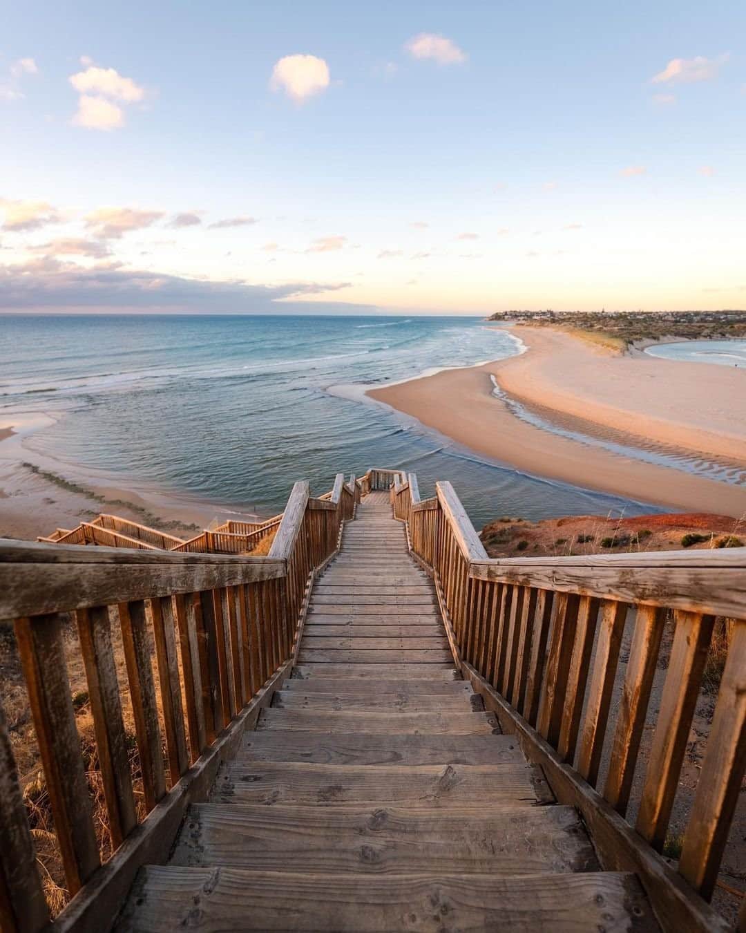 Australiaさんのインスタグラム写真 - (AustraliaInstagram)「We could simply “stair” at this all day 😆 This heavenly sight was captured by @callumjackson on the iconic stairs leading to South Port Beach in @southaustralia 🌊☀️ Just one of the many stunning beaches on the @officialfleurieupeninsula, this particular stretch of sand is perfect for surfing, swimming, fishing and kayaking. Other local beaches to add to your coastal itinerary are #SecondValley for great jetty fishing, #WaitpingaBeach for some epic surf swells, #SellicksBeach where you can drive your car straight into the sand, and #PortWillunga for some Insta-worthy sunset snaps. For more epic ways to expore the Fleurieu Peninsula, head to the link in our bio. #seeaustralia #SeeSouthAustralia #FleurieuPeninsula #holidayherethisyear」2月6日 19時00分 - australia