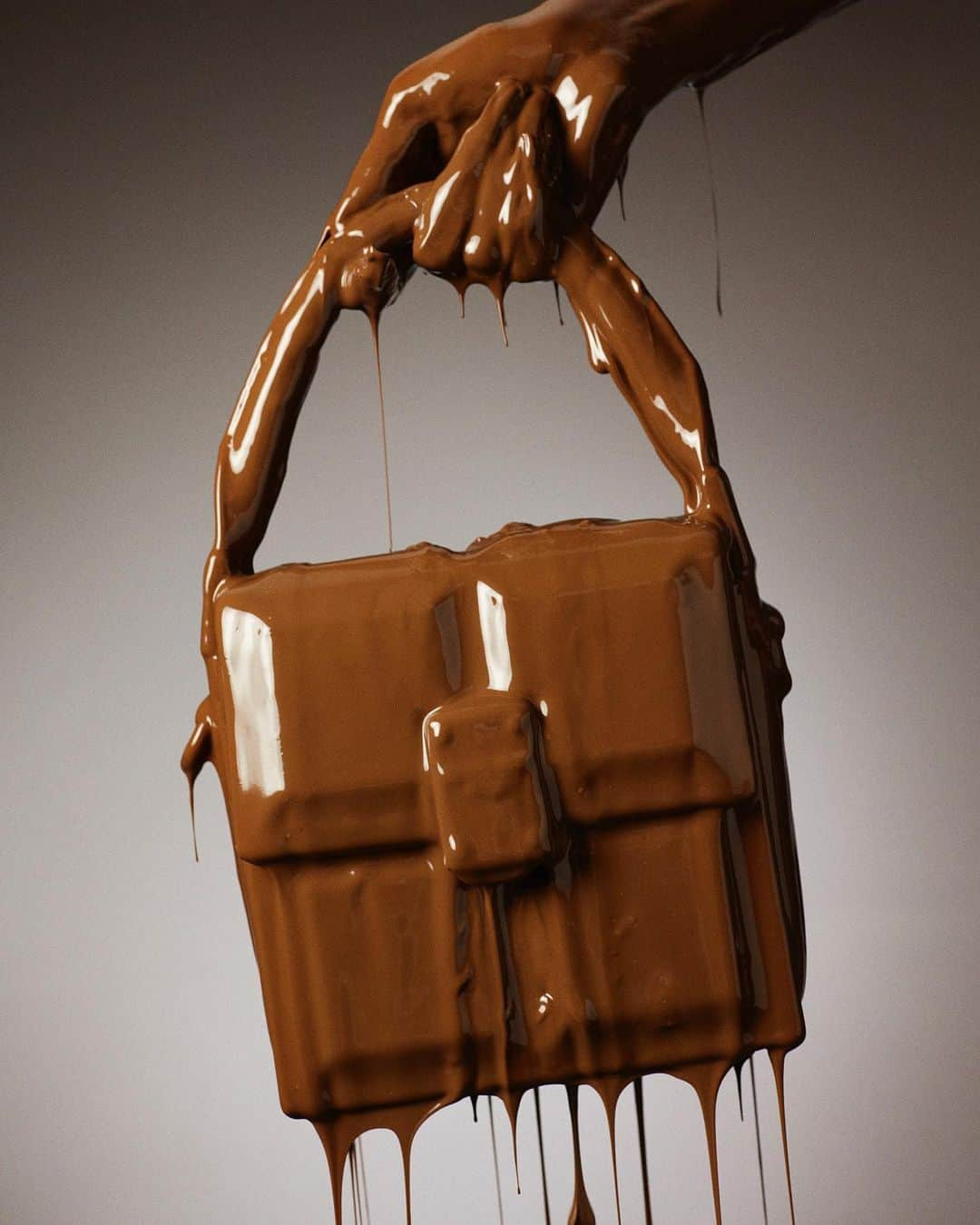 バルマンさんのインスタグラム写真 - (バルマンInstagram)「LE CHOCOLAT. Indulge in the new Chocolat bag collection inspired by the daring declarations of love associated with chocolate. The deep 3D squares designed to replicate the classic barre de chocolat are made of rich leather and add a touch of playfulness to every look. Dark chocolate or milk chocolate, declare your love with the new bag collection available now. Creative Director & Stylist: @kegrand  Photographer/ Director: @akehurstjohn  @theperfectmagazine  #LeChocolatBalmain #BalmainLove.」2月7日 0時47分 - balmain