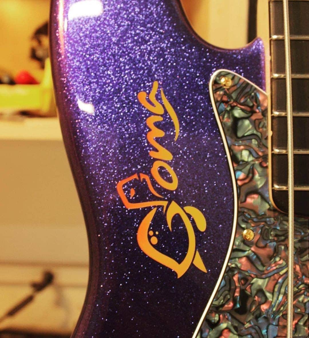 Fender Guitarさんのインスタグラム写真 - (Fender GuitarInstagram)「Master Builder @vincevantrigt_fender built an out-of-this-world '64 Jazz Bass for Chris Goma (@9goma).   Specs include: Purple sparkle with matching headstock, gold hardware with precision bass knobs and cream pickup covers, Josefina Campos hand-wound '60s Jazz Bass pickups, abalone celluloid pickguard, and signature logo airbrushed on the body in sunset burst. Swipe through for a closer look!」2月7日 2時00分 - fender