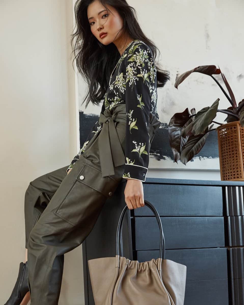 Saks Fifth Avenueのインスタグラム：「Let your new-season wardrobe take shape with the help of @redvalentino’s utility-inspired ensemble and @proenzaschouler’s leather tote. #SaksStyle」