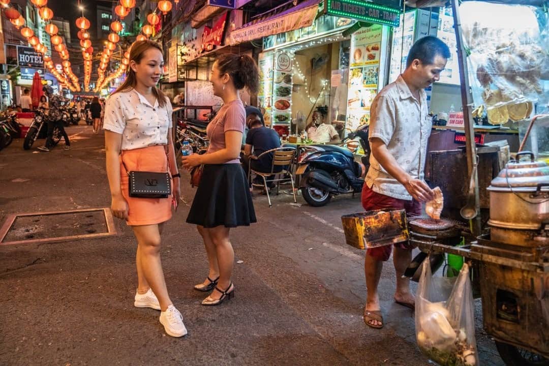 National Geographic Travelさんのインスタグラム写真 - (National Geographic TravelInstagram)「Photo by @amritachandradas / Tring Thi Diem Phuong (left) and her cousin Ly Hang are both seeking husbands. Tring Thi Diem Phuong traveled seven hours from her hometown, Cà Mau, to Ho Chi Minh City only to be rejected by a Singaporean groom. Here they are deciding where to eat after their meeting with the groom.  This assignment is part of a group project with eight women photographers including @davillasana, @ksukuleshova, @miorarajaonary, @mridulaamin, @nicholesobecki, @saiynabashirphoto, and @thanafaroq7 from the Everyday Projects for National Geographic. Our stories look at the impact of women and migration worldwide. My work concentrates on how, over the past decade, more than 50,000 Singaporean men have married foreign women, mostly from Vietnam, Malaysia, and Thailand. The future of foreign brides remains in question, as nine out of 10 permanent residency applications are usually rejected. I look deeper into the migration of Vietnamese women traveling to Singapore with the intention of marriage, documenting their resilience and the vulnerabilities they face.  This story is included in the February issue of National Geographic magazine. Please follow me @amritachandradas for more insight into my work. #everydayprojects #women #migration #everydayeverywhere」1月15日 0時37分 - natgeotravel