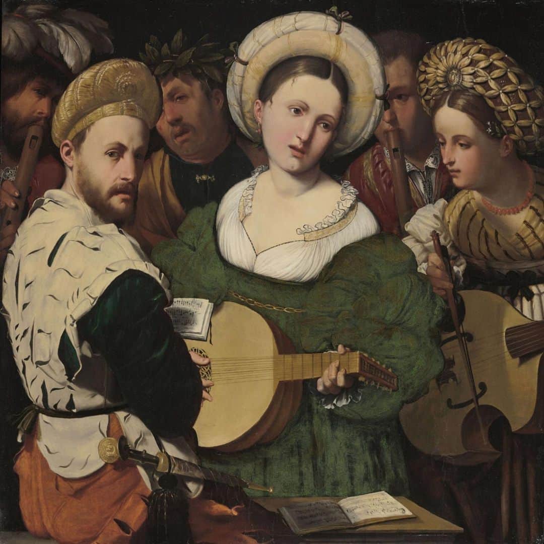 のインスタグラム：「By the early 1500s, particularly in northern Italy, there was a new demand for paintings depicting scenes of daily life rather than religious or mythological subjects. This painting of a private concert is an excellent example of the trend. Two men in the background, flanking another who is crowned with the laurel wreath of a poet, play recorders, while the women in front play string instruments. The elegantly dressed man at left, who is singing from a booklet of sheet music, looks out as if inviting the viewer to join in.  "Musical Group," around 1530, by Callisto Piazza」