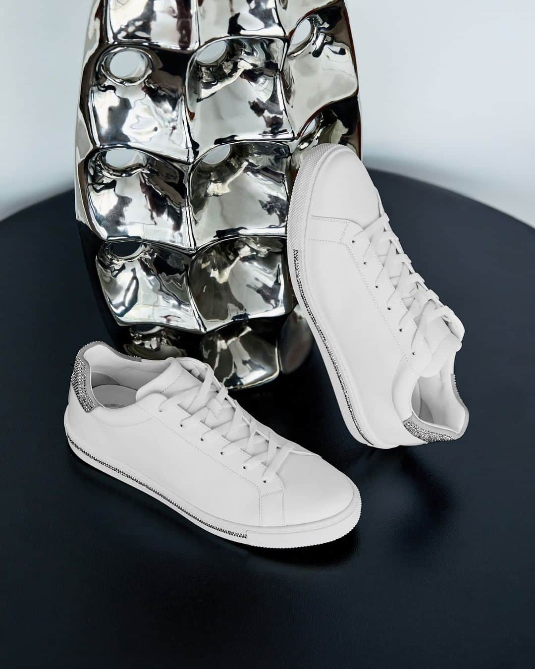のインスタグラム：「Comfy ready-to-wear luxe. #CaovillaSneakers Xtra in white nappa leather and gleaming zircons inlays fuses chicness and dynamism.  #RenéCaovilla #CaovillaDream #CaovillaFW20」