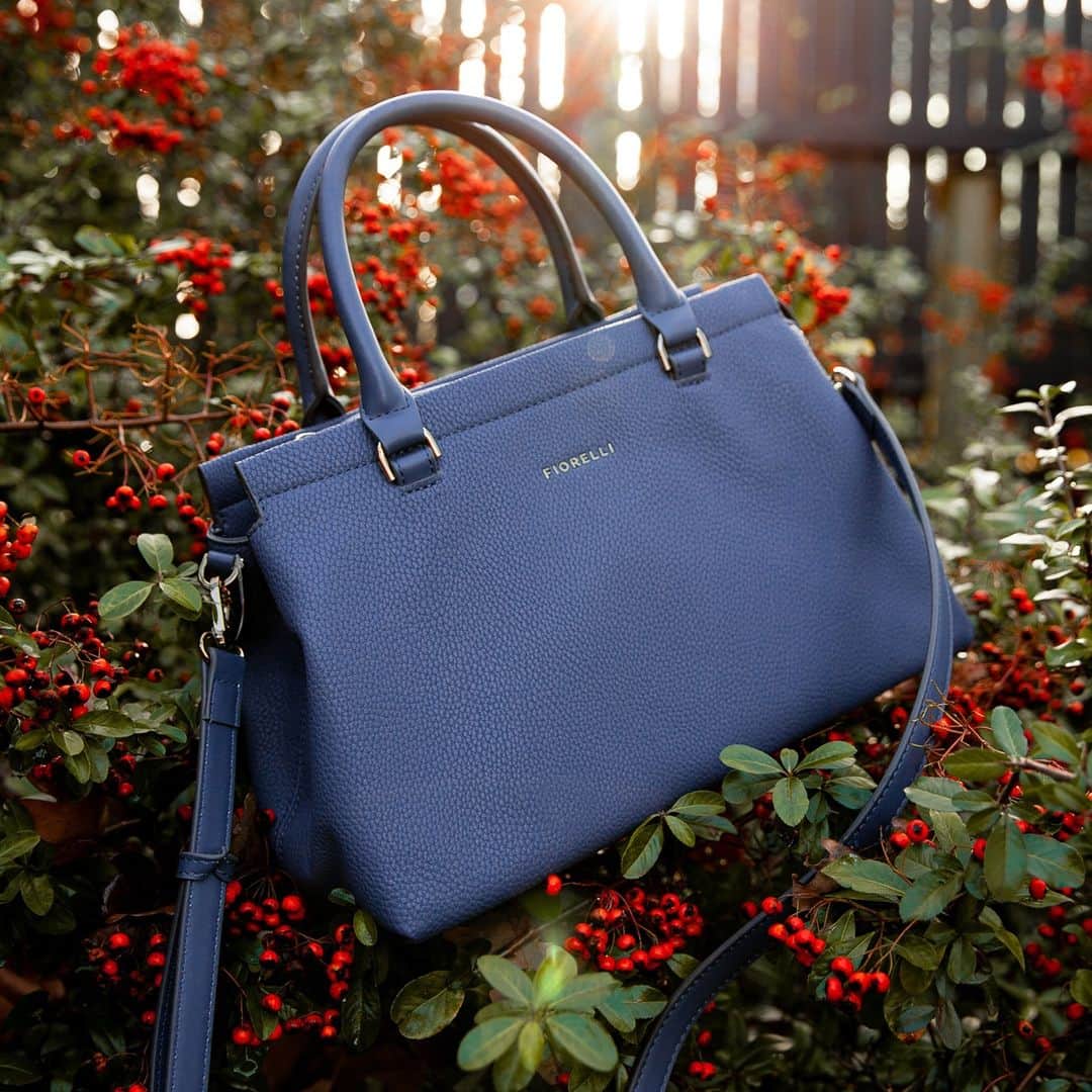 のインスタグラム：「A timeless trio structure in a striking storm blue colourway, now only £26. The detachable crossbody strap and polished hardware adds a sophisticated edge to your everyday ensemble 👌 #FiorelliBags #VeganHandbags」