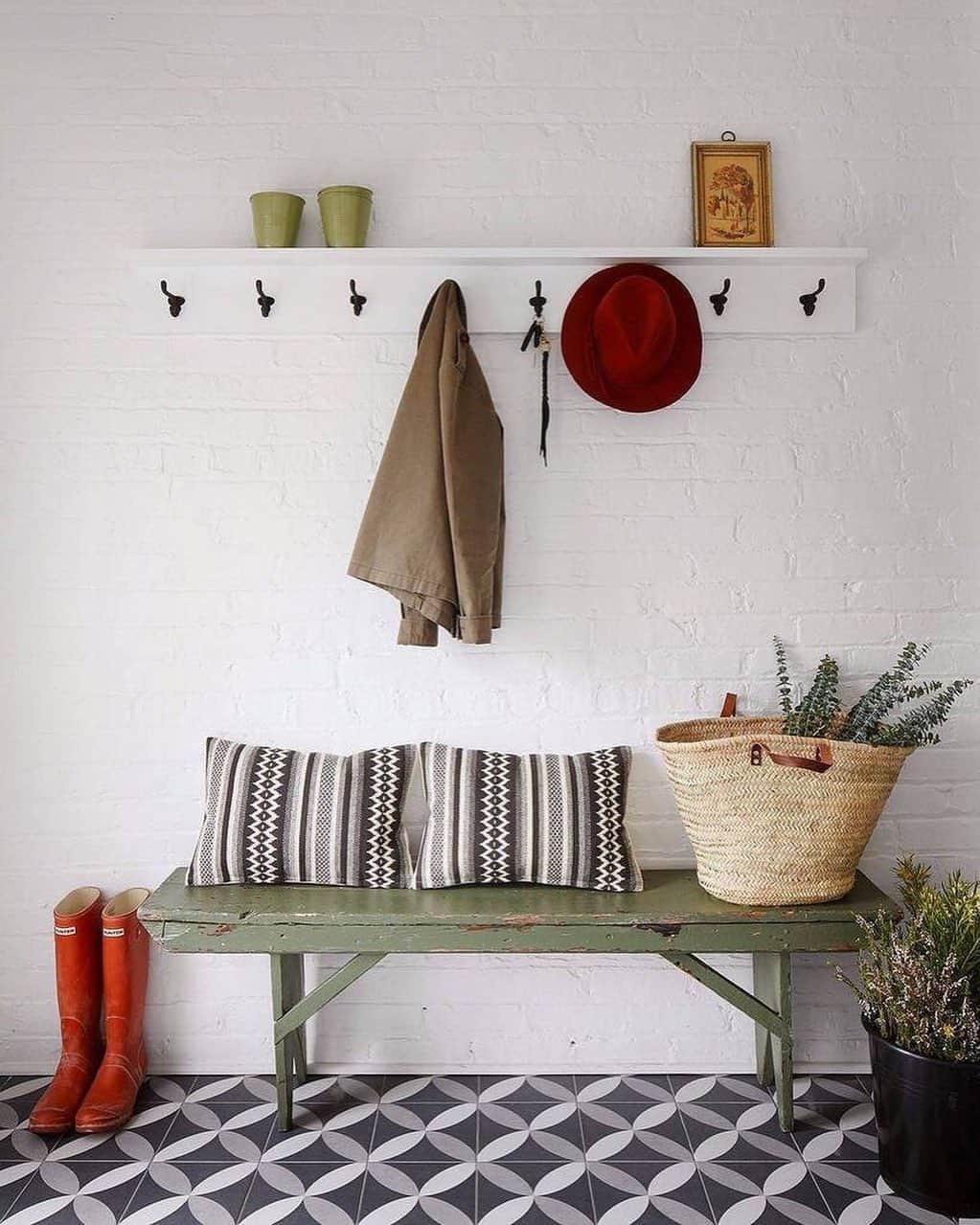 Homepolishのインスタグラム：「It’s finally Friday! Kick-off the boots in a refined mud room that juxtaposes a patterned floor with neutral tones resulting in a sophisticated space. Design by @centered_by_design Photo by @dustinforest   Check out more pro tips from our designers at the link in bio.」