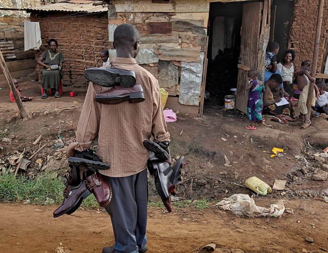 thephotosocietyさんのインスタグラム写真 - (thephotosocietyInstagram)「Photos by Randy Olson  @randyolson "Ugandan security forces on Friday surrounded and then breached the compound of Bobi Wine, the country’s leading opposition candidate, a day after a contentious general election that he said was marred by widespread “fraud and violence...” NY times. Wine lost the national election to Yoweri Museveni, a 76-year-old who has run Uganda for 35 years. It took some time to catch up with Bobi Wine in Kampala a few years ago. When we finally got together Wine explained Museveni wanted to emulate China by getting as many “boots on the ground” as possible before investing in any infrastructure for them. He directed me to a hospital where women were giving birth on the hallway floors and a village that was making small rocks out of big rocks by burning tires around them and eventually supplying gravel for roads. Another quote from todays NY Times: Mr. Wine was arrested three times, along with at least 600 supporters at his rallies. His bodyguard was murdered, his lawyer was detained, and journalists who covered him had their accreditation revoked. Worst of all, when one of Mr. Wine’s arrests led to street protests in November, security forces responded with gunfire, killing at least 54 people.” #BobiWine #YoweriMuseveni #kampala #uganda #elections」1月17日 6時13分 - thephotosociety