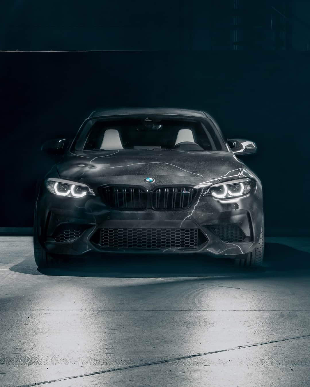 BMWのインスタグラム：「A pleasantly provocative piece of art. The BMW M2 Competition by @futuradosmil. #TheM2 #BMW #M2 #BMWM #BMWIndividual @bmwgroupculture @futuralaboratories __ BMW M2 Competition: Fuel consumption weighted combined in l/100km: 10.0–9.2 (NEDC), CO2 emissions weighted combined in g/km: 227–209 (NEDC). Further information: www.bmw.com/disclaimer   410 hp, 302 kW, 550 Nm, Acceleration (0-100 km/h): 4.0 s, Top speed (limited): 250 km/h (with optional M Drivers Package: 280 km/h).」