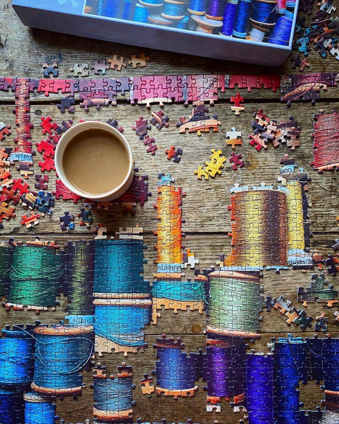 Tea and sittingのインスタグラム：「🧩...I’ve become obsessed with doing jigsaws during this Lockdown and because its actually quite tricky finding puzzles with beautiful and interesting images I decided to design my own 1000 piece puzzle! I’m having 50 of my ‘Colourful Cotton Reels’ printed and they’re now available to pre order in my shop.  They’re currently being finalised along with the box design before printing, and should be ready to ship by mid February. There’s a direct link in my profile as well as a swipe up link in my Stories if you’d like one!  I finished the sample puzzle yesterday ( swipe across to see ) and it was SOO satisfying, even though it was a challenge! 🤗🧩♥️ #jigsawpuzzlesofinstagram #jigsawpuzzleaddict #jigsawpuzzle #jigsawlover #5ftinfjigsaws」
