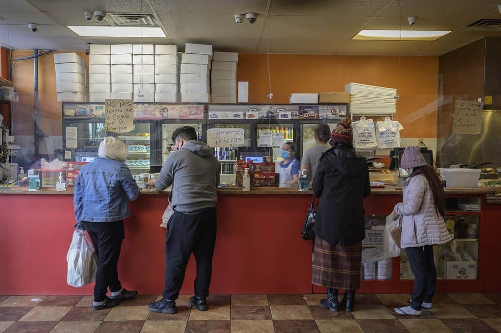 National Geographic Creativeさんのインスタグラム写真 - (National Geographic CreativeInstagram)「Photo by @andreabruce / In suburban Washington, D.C., this locally well-known bakery, with a line snaking around the building all day, is owned by a Mexican and El Salvadoran family. As preparations on the National Mall for the upcoming presidential inauguration block traffic and tighten security downtown, life in other parts of the D.C. area continued as usual.」1月18日 2時41分 - natgeointhefield