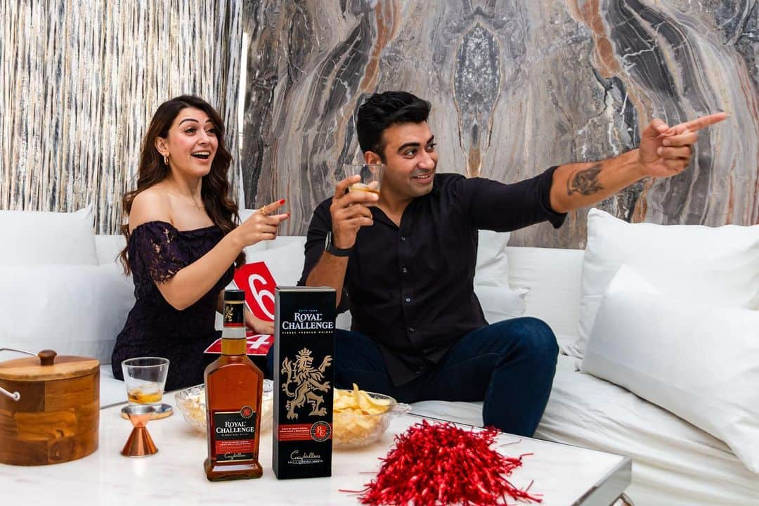 ハンシカ・モトワニのインスタグラム：「It is the time to celebrate the Challenger Spirit of Team India, in all its glory this cricket season with #AllNewRC  The All New Royal Challenge is an amalgamation of Scotch and Indian Malts and aged to perfection making it a smoother and richer dram. Even better, it is now available in Telangana.  #Spon #AllNewRC #DrinkResponsibly #CricketSeasonsWithRC #RoyalChallenge #RoyalChallengeWhisky #ChallengerSpirit #GameSpirit @socialgoatindia」