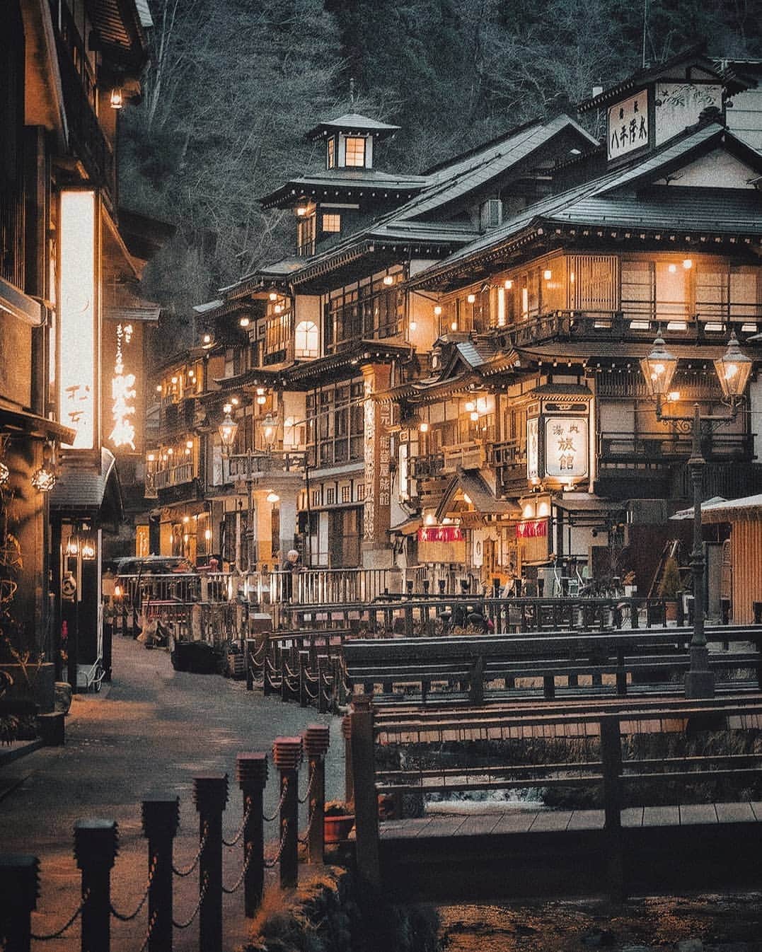 Berlin Tokyoのインスタグラム：「A nostalgic landscape secluded deep in the mountains, away from the rest of the world. . . Ginzan Onsen is located in the mountains, 12 kilometers from the Oshu Highway, and is a sacred place cut off from the rest of the world. It was popular as a therapeutic hot spring resort, but in 1913, the Ginzan River flooded, destroying the hot spring resort, and all the inns were rebuilt with western-style wooden buildings of three to four stories. The town strives to preserve the streetscape of a time when "Spirited Away" bathhouses were not uncommon in Japan. . . . #hellofrom yamagata, #japan」