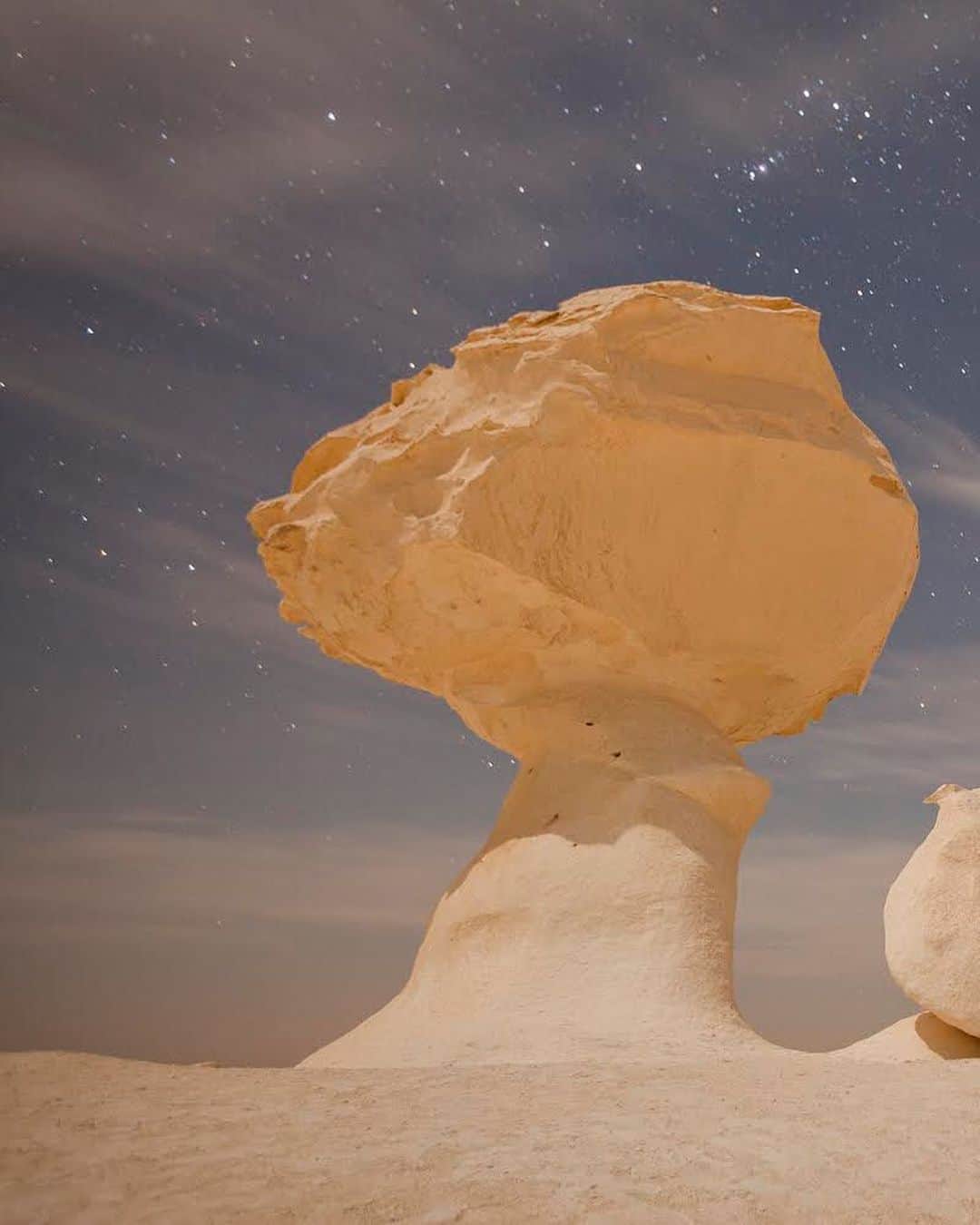 thephotosocietyさんのインスタグラム写真 - (thephotosocietyInstagram)「Photo by George Steinmetz @geosteinmetz  Light of a rising moon on the White Desert of Egypt. This part of the Sahara is covered with soft chalk-white rock that has been eroded by strong Harmattan winds, which sculpt the stone into strange and beautiful shapes. To explore more of our world, follow @geosteinmetz.」1月18日 1時15分 - thephotosociety
