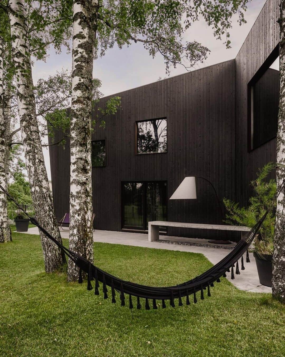 Architecture - Housesさんのインスタグラム写真 - (Architecture - HousesInstagram)「⁣ 𝗔𝗿𝗰𝗵𝗶𝘁𝗲𝗰𝘁𝘀’ 𝗛𝗼𝘂𝘀𝗲 🖤⁣ The structure of this house was built offsite as a prefab. Timber is a versatile, sustainable and resilient building material and it allowed to create the tilting shape of the house.The grey-stained Baltic timber cladding has a silver patina which is complemented by the rusted metal entranceway and window surrounds.⁣ What do you think about this #architecture material? Do you like how it works in this project?⁣ Leave your comment...we read you!🧐⁣ _____⁣⁣⁣⁣⁣⁣⁣⁣⁣⁣⁣⁣⁣⁣⁣⁣⁣⁣⁣⁣⁣⁣⁣⁣⁣⁣⁣⁣⁣⁣⁣⁣⁣⁣⁣ 📐@openad_lv 📍Bierini, Riga, Latvia⁣ #archidesignhome⁣ _____⁣⁣⁣⁣⁣⁣⁣⁣⁣⁣⁣⁣⁣⁣⁣⁣⁣⁣⁣⁣⁣⁣⁣⁣⁣⁣⁣⁣⁣⁣⁣⁣⁣⁣⁣ #architect #arquitectura #luxury #architettura #interiordesign #archilovers #home #house ‎#amazing #architecturephotography #amazingarchitecture⁣⁣ #realestate #photooftheday #construction #archilovers #home #house ‎#amazing #picoftheday #archigram #ModernArchitect #building」1月18日 1時41分 - _archidesignhome_