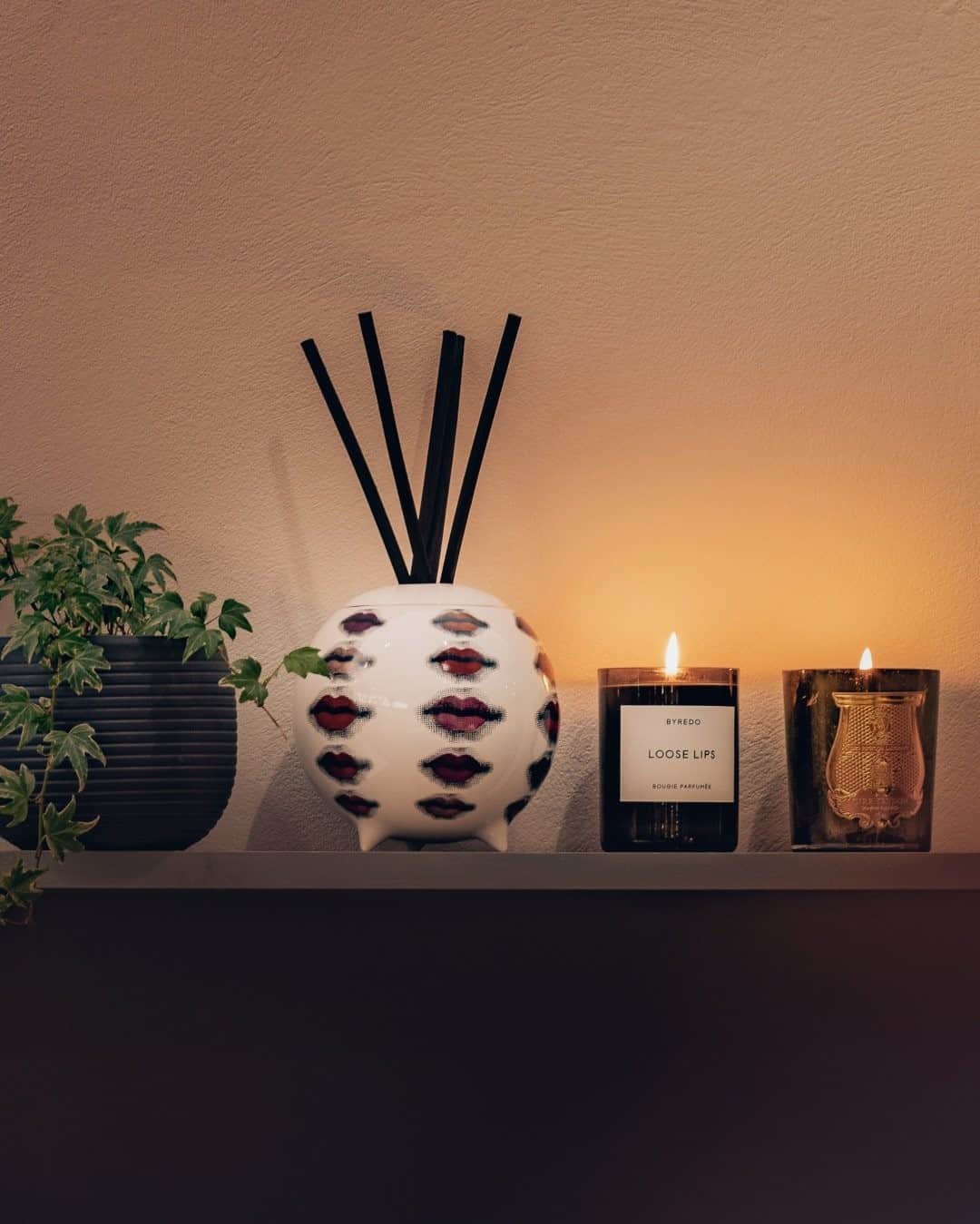 MR PORTERのインスタグラム：「Congratulations - that's another Monday in the bag. Now, time to kick back, don't you think? #MRPORTERatHome  Shop the story: Fornasetti - Rossetti Diffusing Sphere @officialbyredo Loose Lips candle Cire Trudon - Madeleine Scented Candle, 270g」