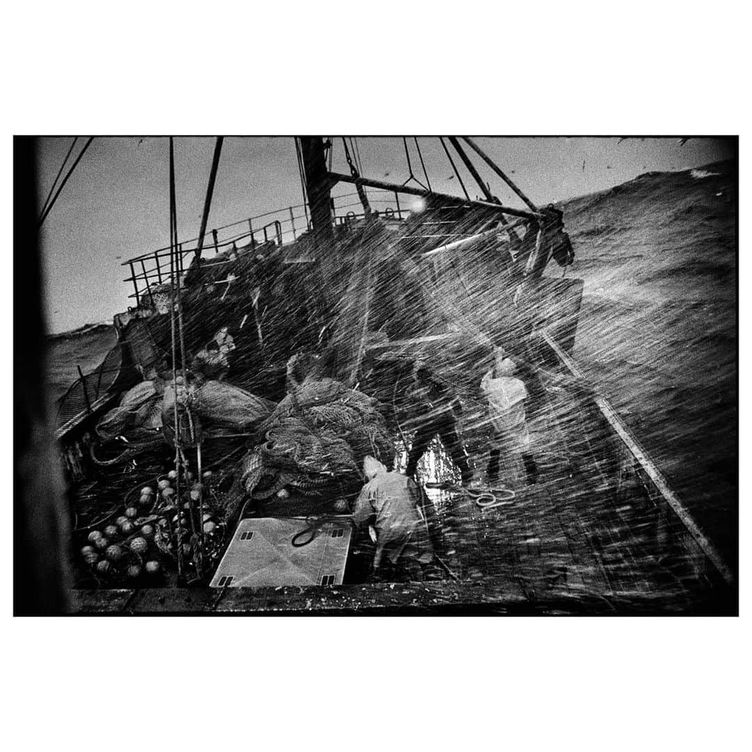 Magnum Photosさんのインスタグラム写真 - (Magnum PhotosInstagram)「@jeangaumy: “Hurled when the boat dives, the steep and greasy stairs we climb become a pestle as we go over a wave. [...]Everything flutters about. [...] The unpredictable grey sky devastated with spindrifts, and the ocean at the edge, full of white flurries.” - Jean Gaumy, in Pleine Mer: Men At Sea. ⁠ .⁠ Over 14 years, French photojournalist @jeangaumy captured the fierce conditions facing the fishermen who worked on open-deck trawlers, capturing the harsh reality of life at sea. ⁠ .⁠ This image is now available as a limited edition 8x10" print as part of our Magnum Editions collection.⁠ .⁠ Find this image and explore the full collection at the link in bio.⁠ .⁠ PHOTO: On board the Spanish trawler "Rowanlea". Europe. North Atlantic. 1998.⁠ .⁠ © @jeangaumy/#MagnumPhotos」1月18日 23時01分 - magnumphotos