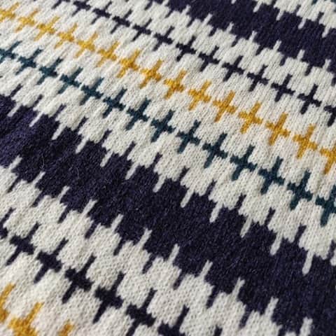 のインスタグラム：「Vous ne trouvez pas comme un petit air de pixel avant l’heure? Voici un jacquard tiré de nos archives dont le style graphique faisant penser à un pixel est totalement involontaire, car à l’époque c’était tout ce que la mécanique de ce métier permettait !  Originellement tricoté en laie Shetland, Alexandre et ses frères portèrent ce pull familial pendant des années. Vous aussi vous voulez l’adopter ? 🧶  _____  Don’t you think it looks like some pixels before the time? Here’s a jacquard from our archives whose graphic style reminiscent of a pixel is totally involuntary, because at the time it was all that the mechanics of this craft allowed!  Originally knitted in Shetland wool, Alexandre and his brothers wore this family sweater for years. Do you want to adopt it too?  #lemontstmichel #knitwear #vintageknitwear #archiveknitting #frenchfashion」
