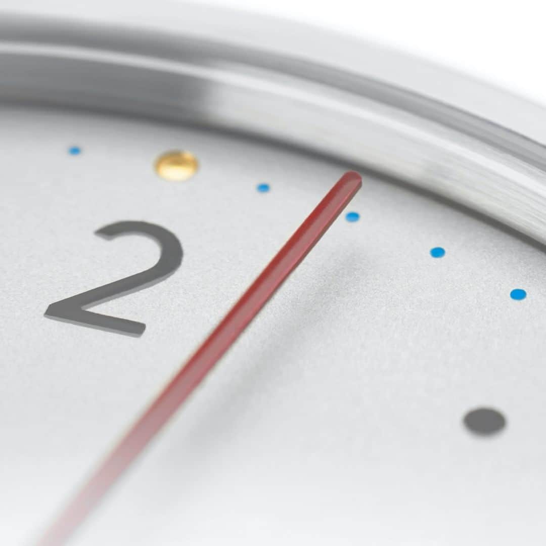 のインスタグラム：「Cyan blue and golden minute and hour makers, perlage, and lightly rounded red hands make this dial one of a kind—but which NOMOS watch are we talking about this Macro Monday?  #nomos #nomosglashuette #MacroMonday」