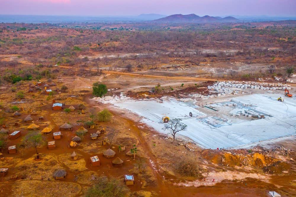 thephotosocietyさんのインスタグラム写真 - (thephotosocietyInstagram)「Photo by @jasperdoest #onassignment for WWF Zambia // A granite mine close to Soka Village in Nyimba district, Zambia.  Nyimba district is located in Eastern province, with most people depending on agriculture for their livelihoods. The mine was set up over 7 months ago, and is exploring granite. Unfortunately it’s positioning within Soka Village, leaves the people in a vulnerable position. The land was originally used as traditional land, meaning it belongs to the chief as does most of the land in Soka village. The mine hired the area ward councillor as the mine’s Human Resource Manager, which helped pushing its operations through. Besides health risks related to the digging of granite at close proximity to the village, a borehole drilled by the mine that has affected the amount of water the community in this area is receiving.  Two months after taking this photographs, @wwfzambia used the imagery to inform an environmental agency to check on the mine. The next day the mine wrote a letter to the Ministry, saying that they finished exploring this site.  Follow @jasperdoest for more conservation stories.  #mine #mining #conflict #conservation」1月19日 0時33分 - thephotosociety