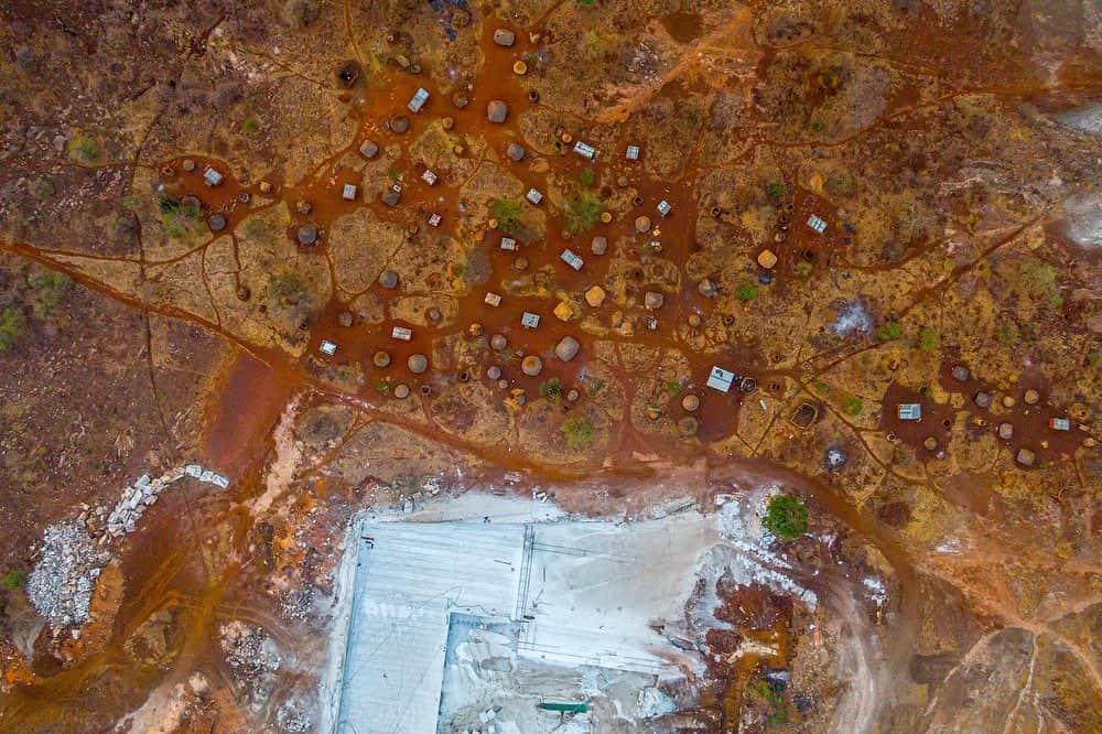 thephotosocietyさんのインスタグラム写真 - (thephotosocietyInstagram)「Photo by @jasperdoest #onassignment for WWF Zambia // A granite mine close to Soka Village in Nyimba district, Zambia.  Nyimba district is located in Eastern province, with most people depending on agriculture for their livelihoods. The mine was set up over 7 months ago, and is exploring granite. Unfortunately it’s positioning within Soka Village, leaves the people in a vulnerable position. The land was originally used as traditional land, meaning it belongs to the chief as does most of the land in Soka village. The mine hired the area ward councillor as the mine’s Human Resource Manager, which helped pushing its operations through. Besides health risks related to the digging of granite at close proximity to the village, a borehole drilled by the mine that has affected the amount of water the community in this area is receiving.  Two months after taking this photographs, @wwfzambia used the imagery to inform an environmental agency to check on the mine. The next day the mine wrote a letter to the Ministry, saying that they finished exploring this site.  Follow @jasperdoest for more conservation stories.  #mine #mining #conflict #conservation」1月19日 0時33分 - thephotosociety