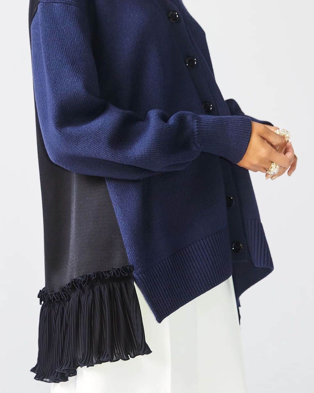 アディアムのインスタグラム：「Up Close: #ADEAM Osaka Cardigan. A classic v-neck cardigan combined with a textured satin trimmed hem.」
