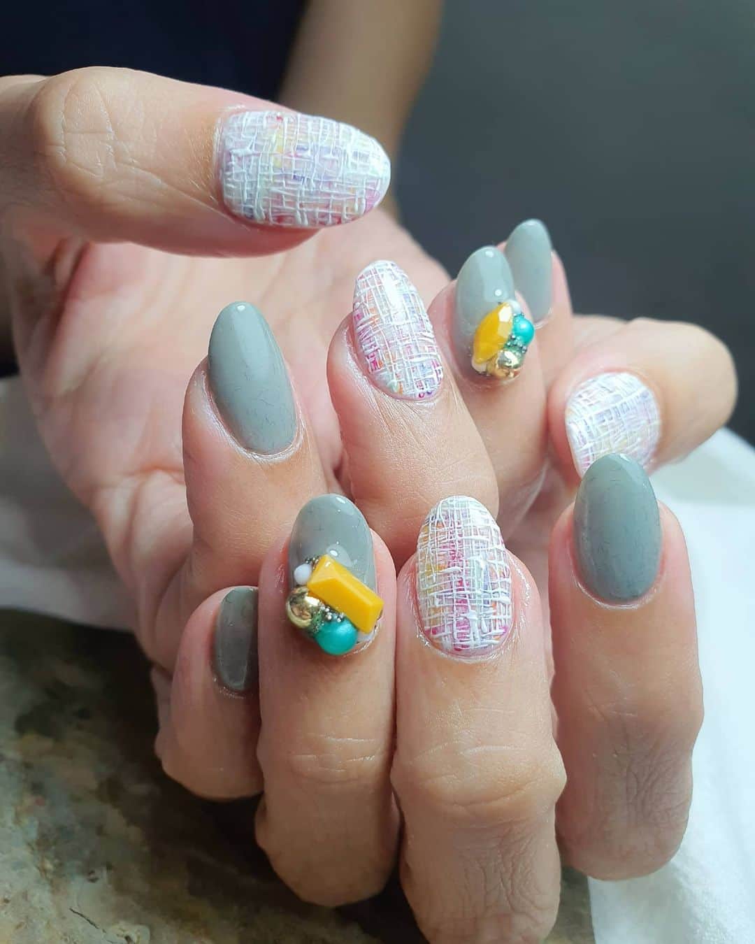 Yingのインスタグラム：「I used PREMDOL MUSE G656 and G653 for the base. Embossed tweed done with PREGEL Art Liner in White. Art colours include PREGEL Red, Yellow, Orange, Purple, Milky Benjamin, and PREMDOLL #633. items can be purchased at @nailwonderlandsg 🤗 . Design referenced from @flickanail . . 🛒 www.nailwonderland.com⁣⁣ 📍20A Penhas Road, Singapore 208184⁣⁣ (5 minutes walk from Lavender MRT)⁣⁣ .  I am currently only able to take bookings from my existing pool of customers. If I have slots available for new customers, I will post them on my IG stories. Thank you to everyone who likes my work 🙏 if you need your nails done, please consider booking other artists at @thenailartelier instead ❤  #ネイルデザイン  #ネイルアート #ネイル #ジェルネイル #nailart #네일아트 #pregel #プリジェル #nails #gelnails #sgnails」