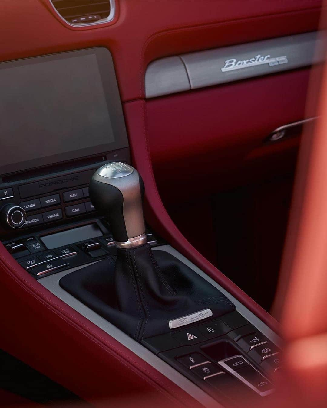 Porscheさんのインスタグラム写真 - (PorscheInstagram)「Striking red interiors coupled with silver exterior paintwork - an iconic colour palette that brings that roadster feeling to life, before you’ve even sat down. Go on, take a seat inside the Boxster 25 years.  Discover more: link in bio. __ Boxster 25 years: Fuel consumption combined: 10,9 - 10,1 km; CO2 emissions combined: 247 - 230 g/km  https://porsche.click/DAT-Leitfaden  Status: 01/2021」1月19日 19時58分 - porsche